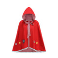 A red hooded cape with a pink-and-white gingham lining, featuring a matching bow at the neck, embroidered flowers and a black cat motif near the hem, and a white scalloped edge.