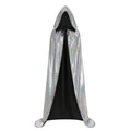 A long hooded cape with a silver holographic sequin exterior and a solid black interior lining, shown against a plain white background.